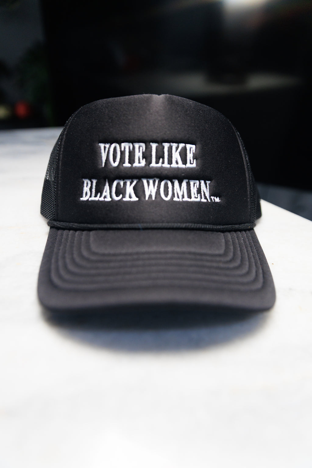 White on Black Trucker