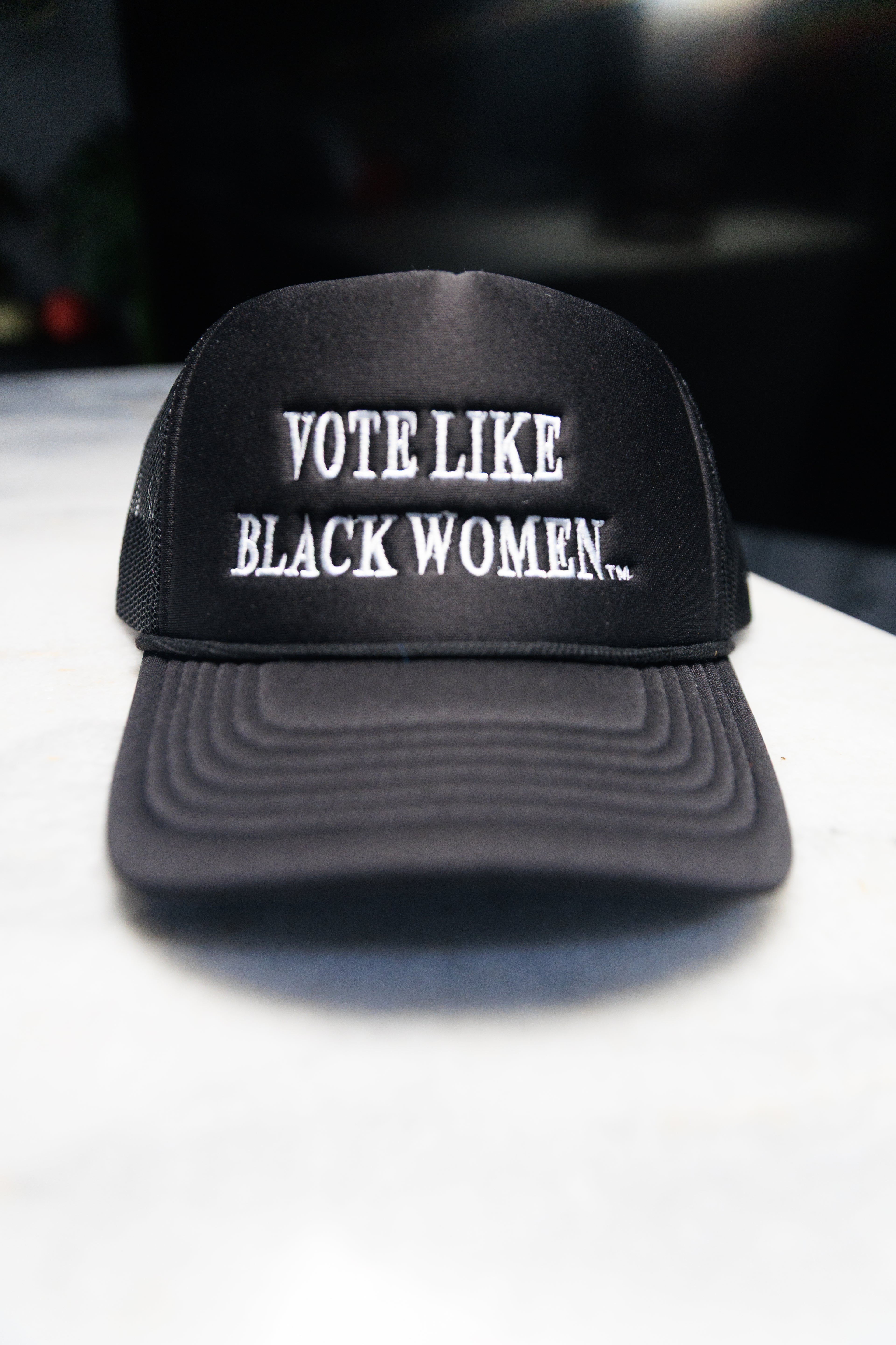 White on Black Trucker